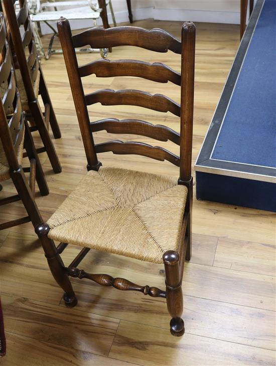 A set of six ladderback rush seated chairs